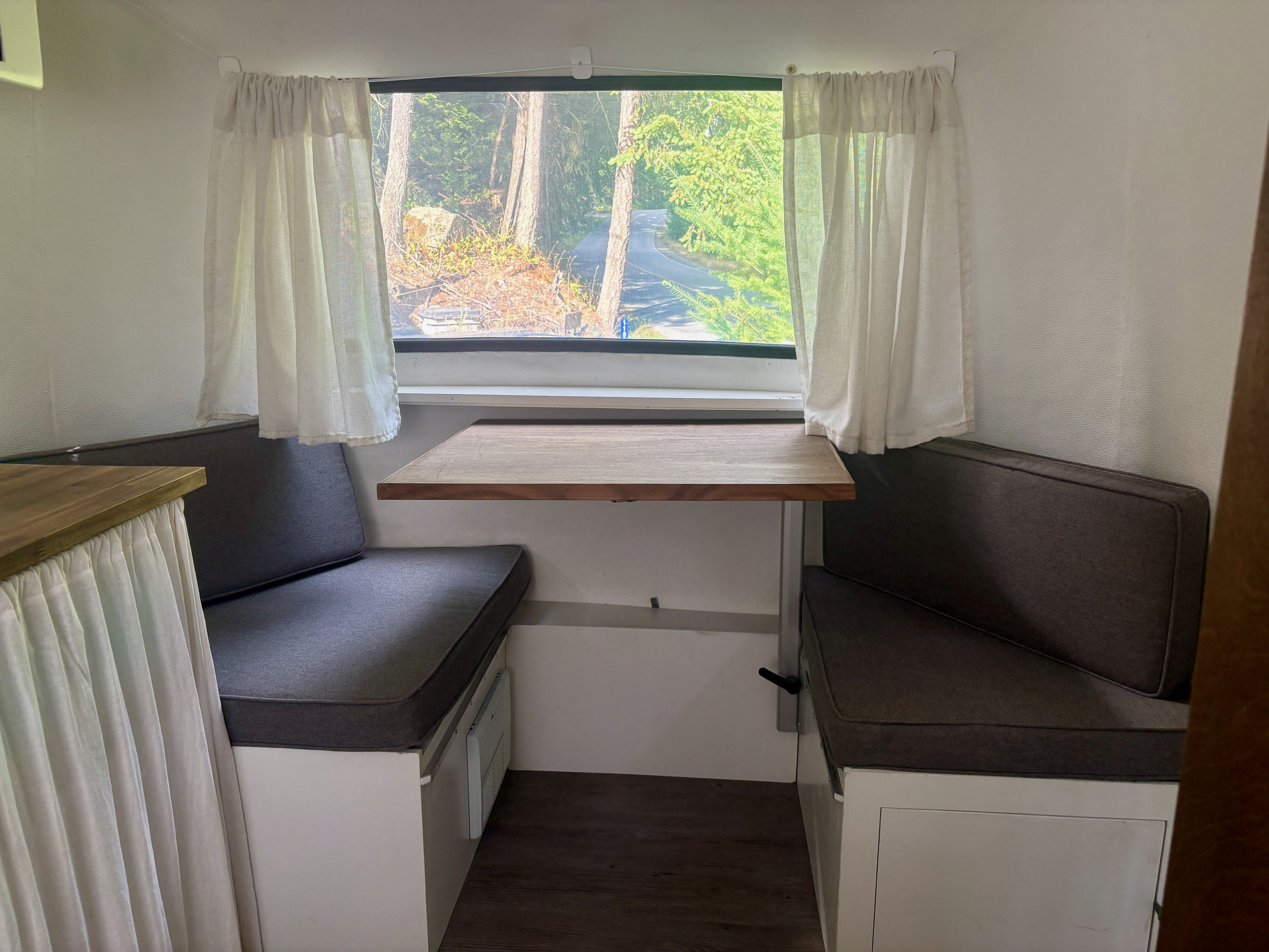 Bistro table setup inside the Boler trailer.